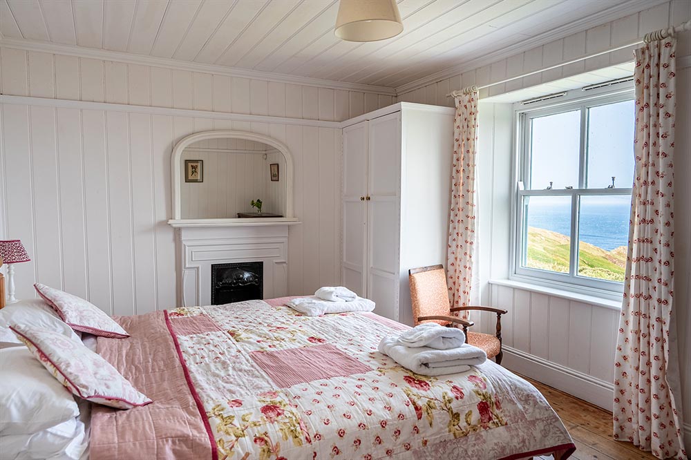 Double bedroom with sea views at Chy Barnett holiday cottage, Land's End Cornwall