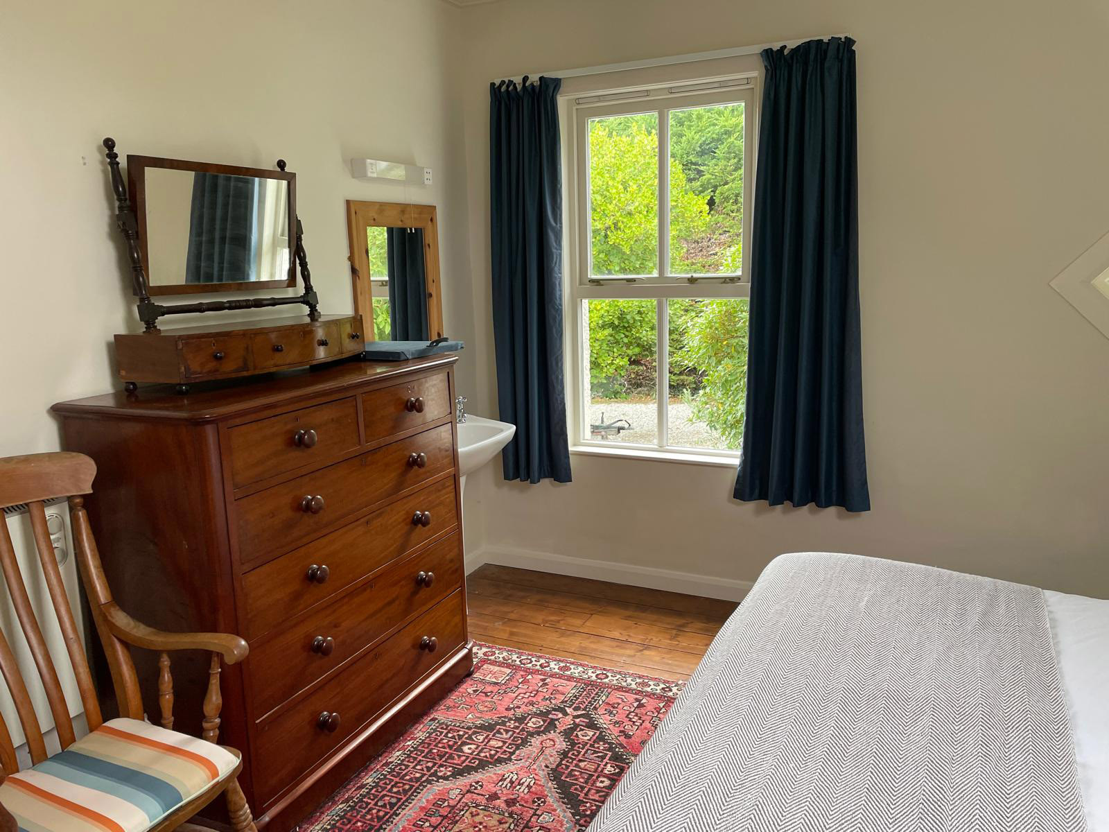 Bedroom four - with 6 foot double bed and hand basin
