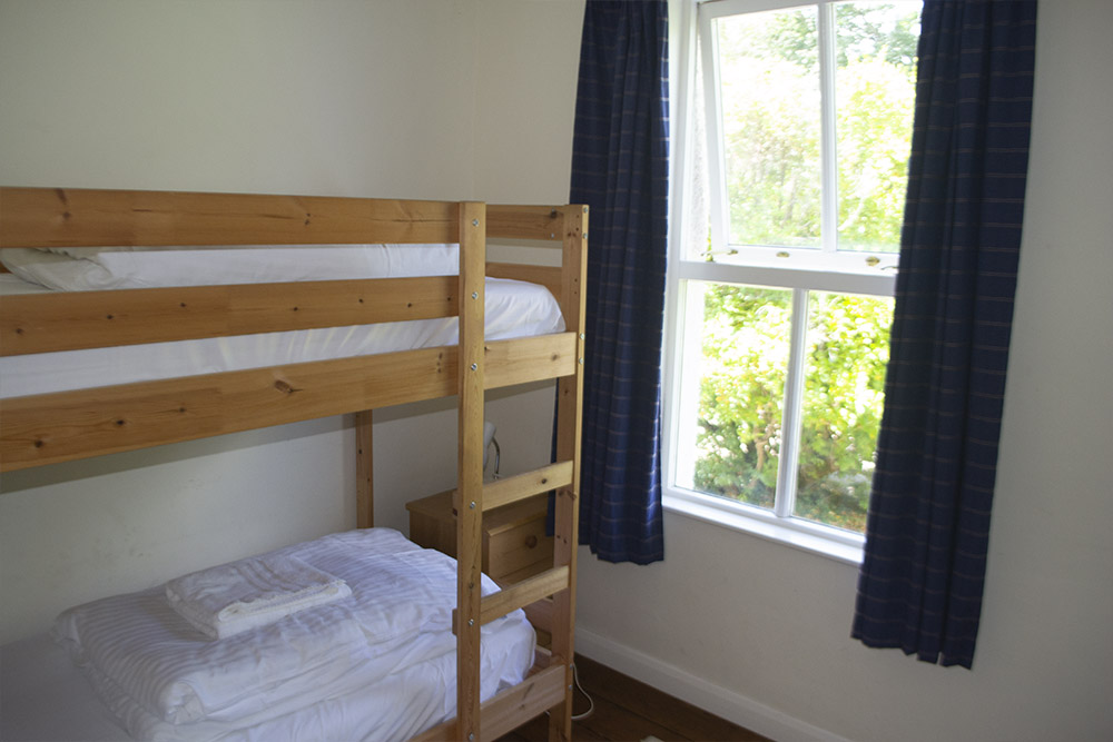 Bunk bedroom with 3 foot beds