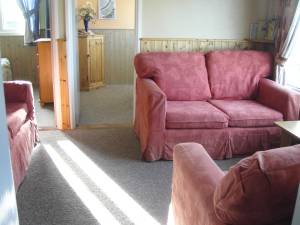 Manhattan is a detached privately owned chalet fully equipped to a high standard throughout sleeping 6 people in 3 double bedrooms. Wonderful views. Only a 5 minute walk from the beach.