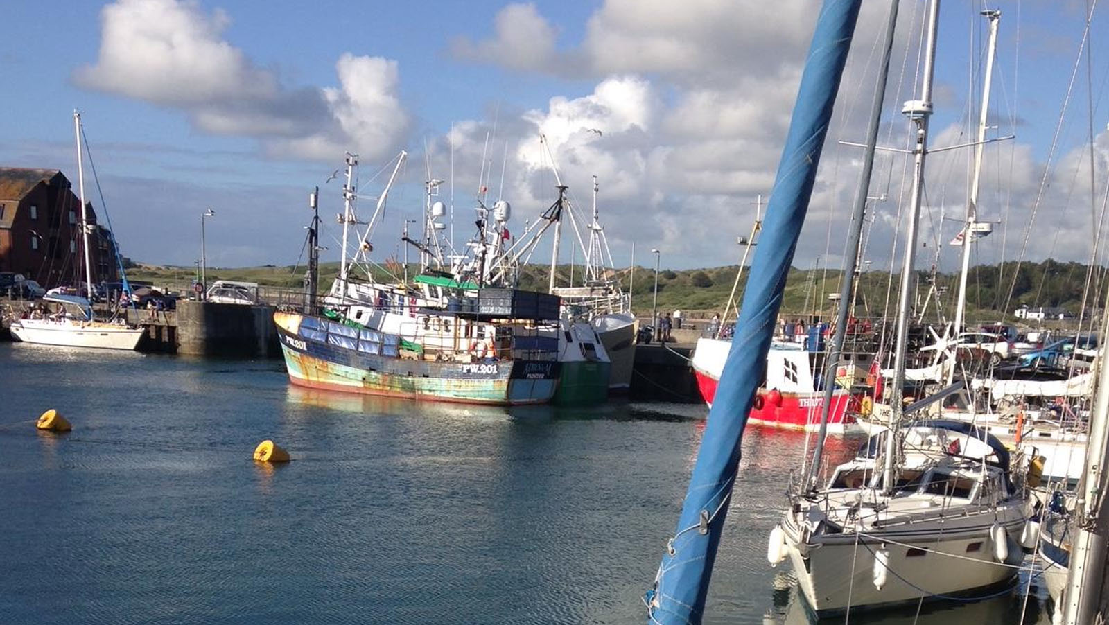 Fishing boats moored inside the lock gates of Padstow inner harbour