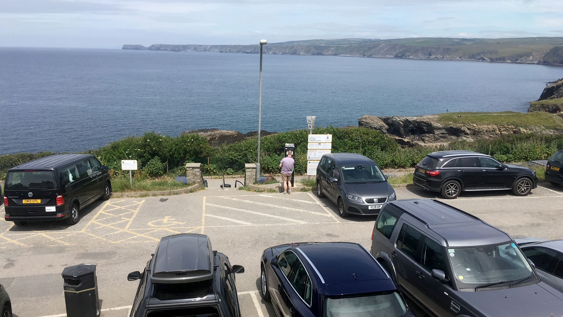 New Road car park beside the coast path at Port Isaac, with views along the coast towards Tintagel