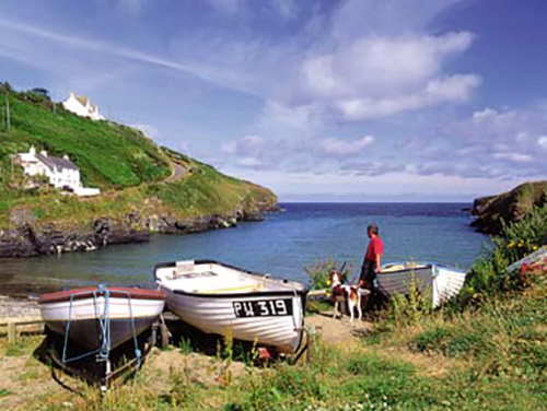 Fishing boats drawn up above the cove at Port Gaverne