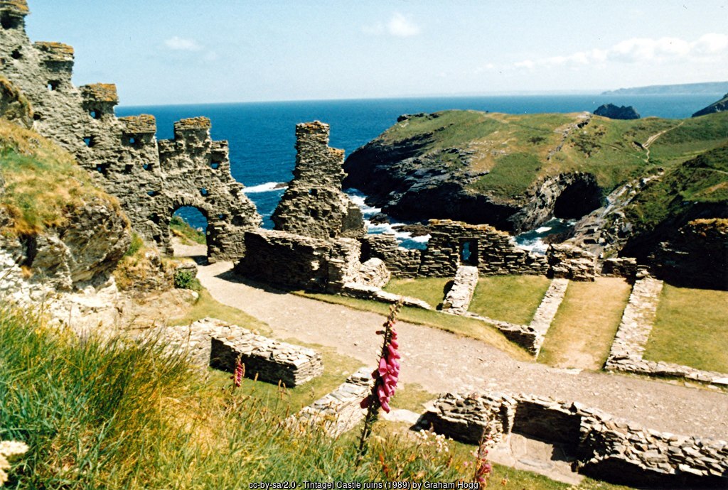 The ruined walls of Tintagel Castle on the mainland, with the island beyond