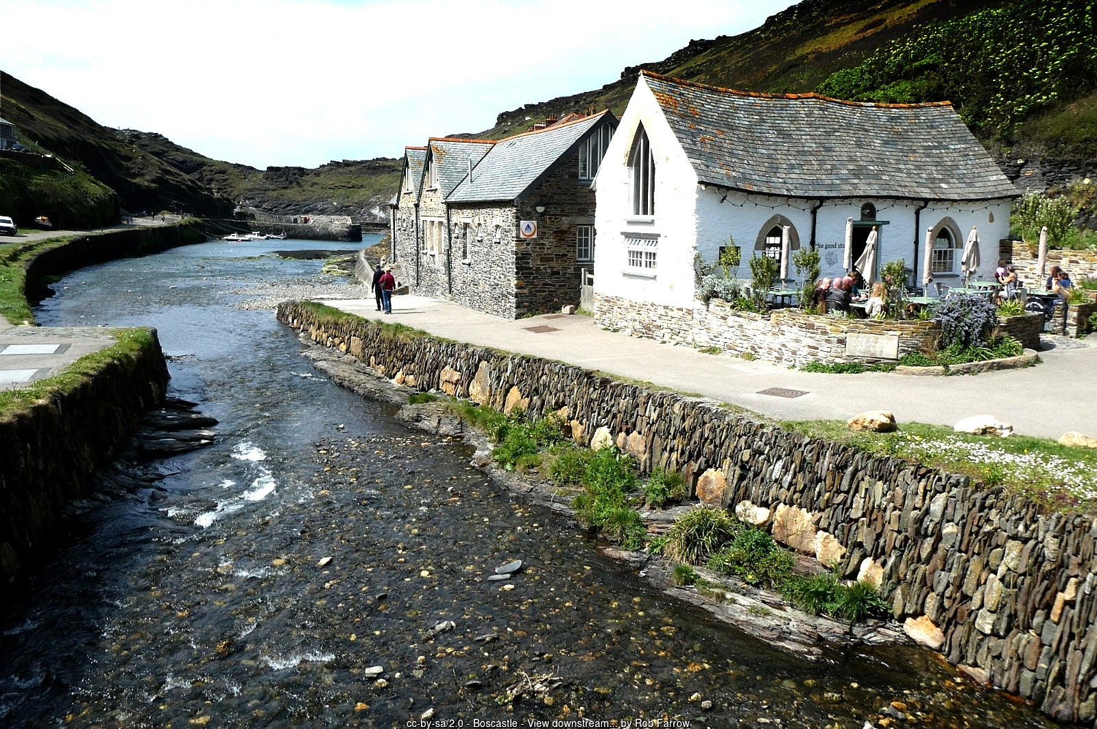 The River Valency flowing down to Boscastle harbour, with the white Pixie House on the right
