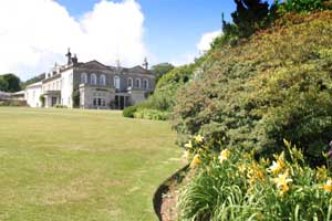 Lawn and flower borders in front of Trengwainton House
