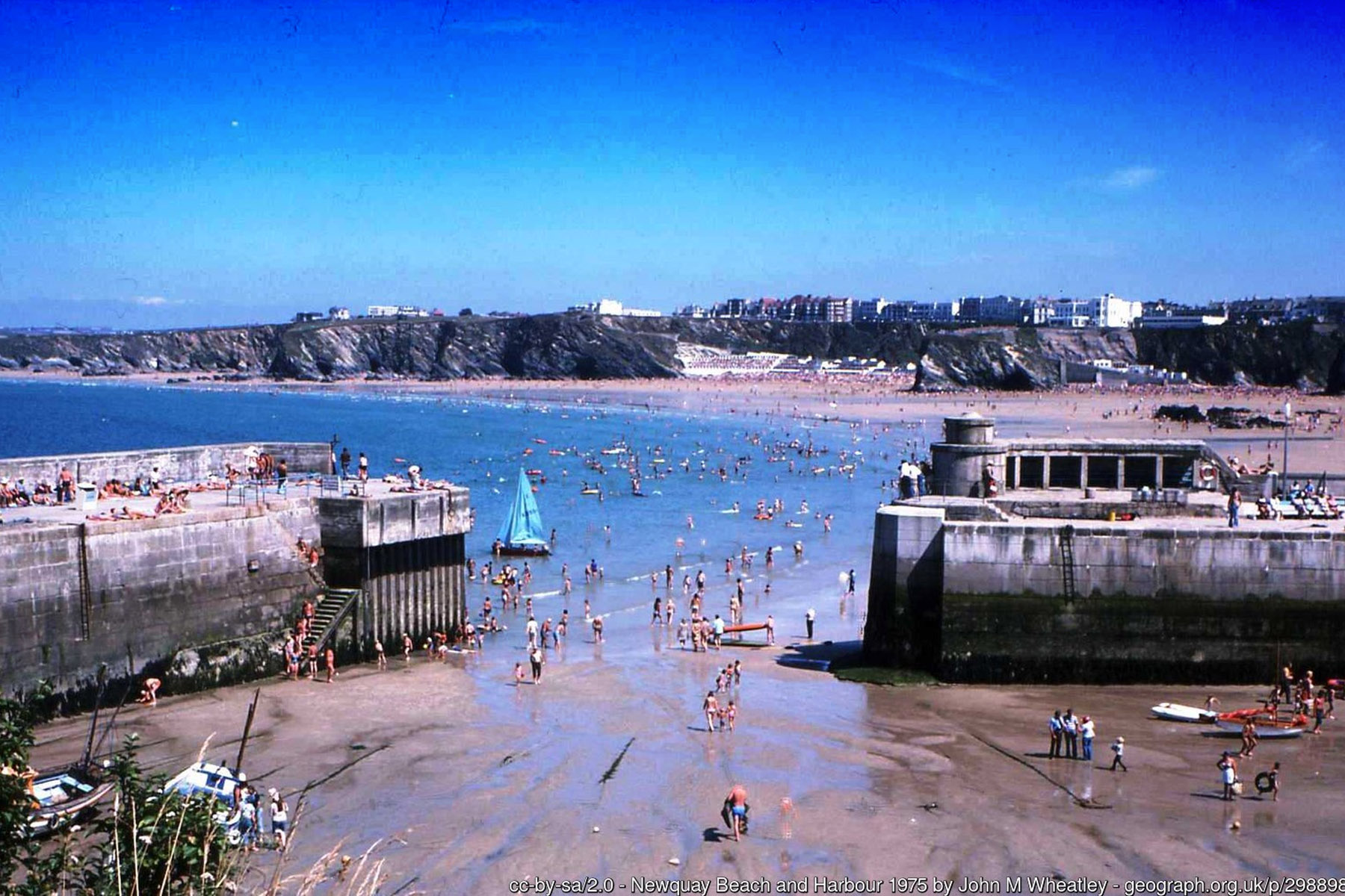 The Harbour Beach Newquay Cornwall at low tide  sheltered sand in the working harbour - Cornwall family holidays