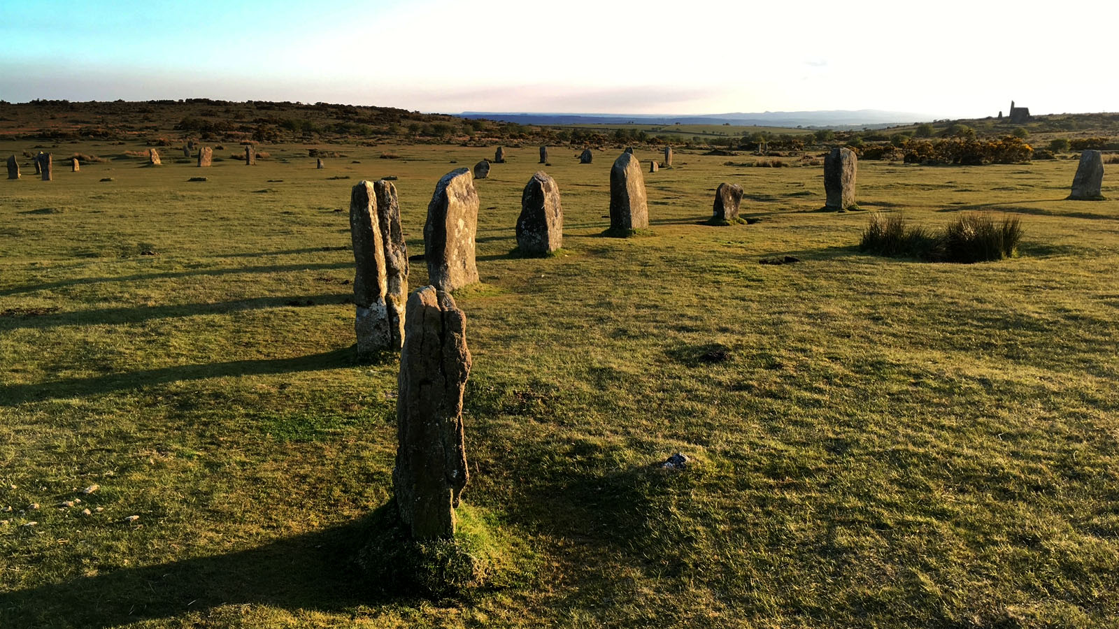 Standing stones of the Hurlers stone circle at Minions in early evening light