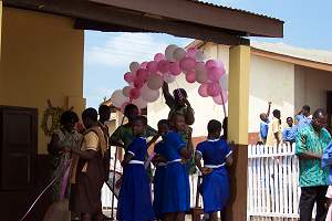 Putting up the ribbon for the opening