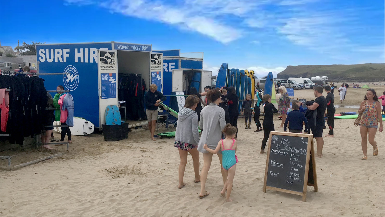 Surf hire huts at the entrance to Polzeath beach