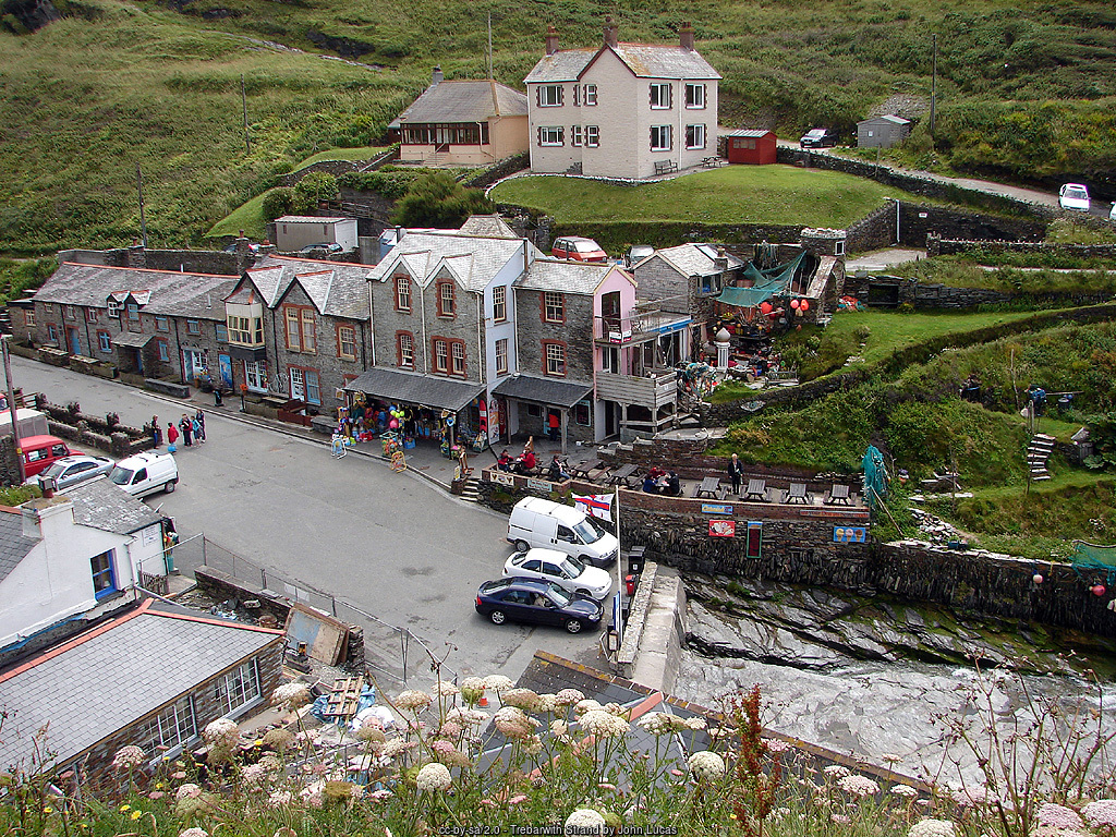 The hamlet of Trebarwith Strand, with the slipway, caf&eacute; and surf shop above the beach